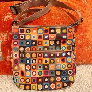 So cute! Colorful & fun! Soft nylon material shoulder or crossbody purse.